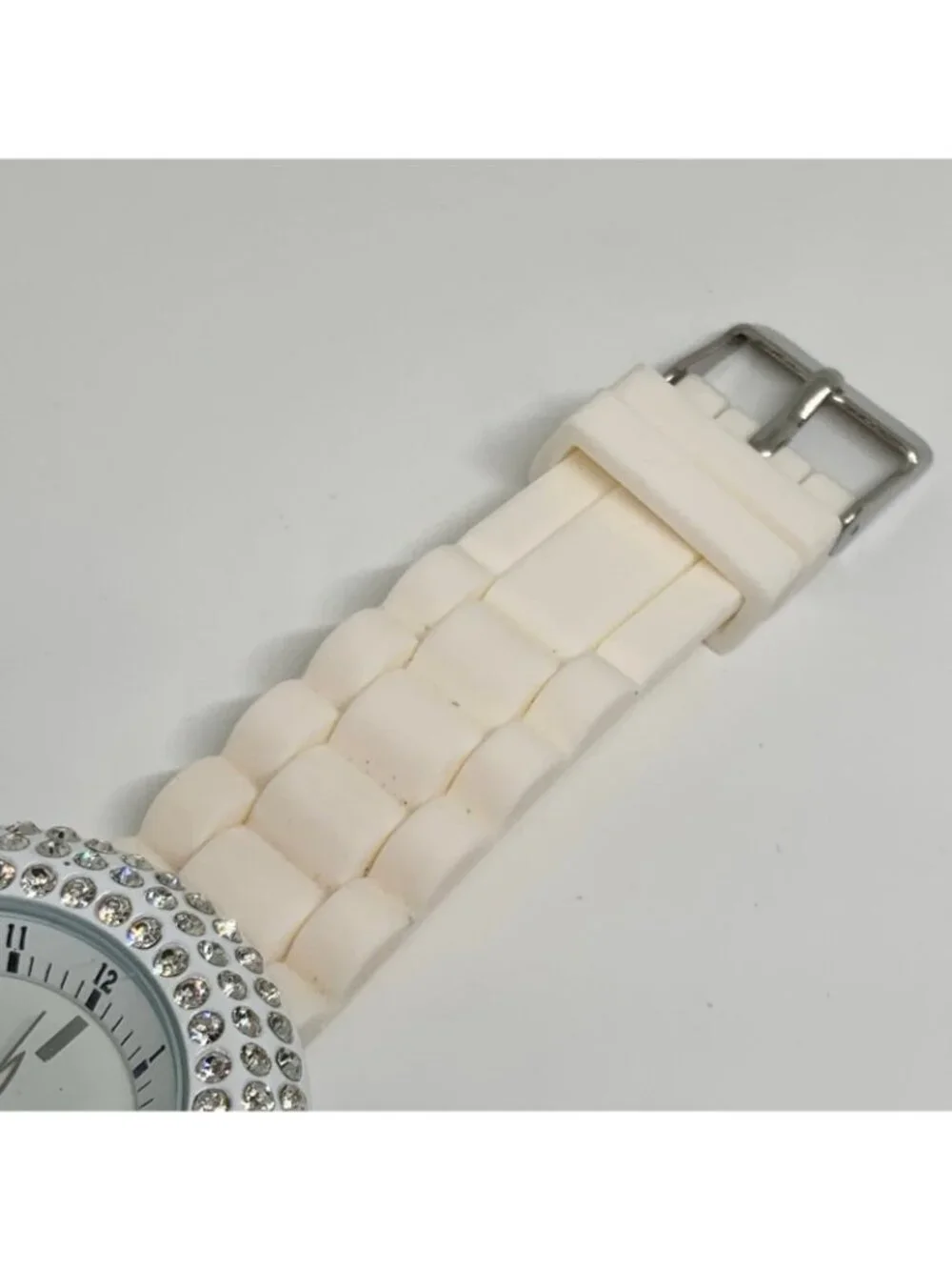 Geneva women’s watch white tone rhinestones 45mm silicone band running